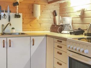 Kuchyň nebo kuchyňský kout v ubytování Holiday home Naustbukta