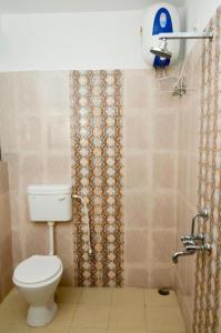 Ванна кімната в Utsav Resorts By WB Inn