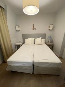 Posteľ alebo postele v izbe v ubytovaní Presqu île de la touques deauville N 3404