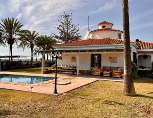 Bazén v ubytovaní Beach house 'Tiempo Lento' alebo v jeho blízkosti