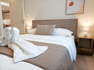 Posteľ alebo postele v izbe v ubytovaní Amelie Apartment