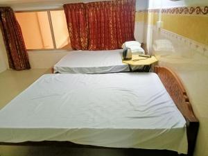 Posteľ alebo postele v izbe v ubytovaní Good Luck Hostel