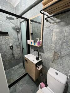 Koupelna v ubytování Pembe Hotel
