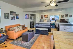 a living room with a couch and a stove at Peaceful Pet-Friendly Payson Vacation Rental in Payson