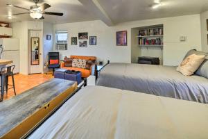 a living room with two beds and a couch at Peaceful Pet-Friendly Payson Vacation Rental in Payson