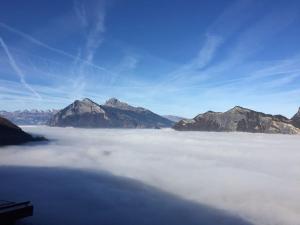 a view of a sea of clouds and mountains at Komplettes Hotel mit 10 Zimmern in Bad Ragaz