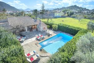 an aerial view of a villa with a swimming pool at Owl Booking Villa Can Gorreta - 5 Min Walk To The Old Town in Pollença