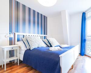 Posteľ alebo postele v izbe v ubytovaní Villa Mistral by Baltic Home
