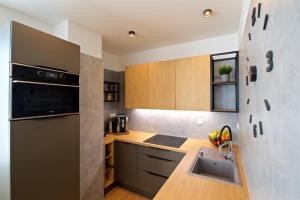 Kuchyňa alebo kuchynka v ubytovaní CITY PRESTIGE apartment Trencin