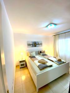 a bedroom with a large bed in a room at Ocean Golf & Country Club J&K in San Miguel de Abona +57 photos