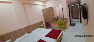 Μια τηλεόραση ή/και κέντρο ψυχαγωγίας στο Hotel Aaditya Palace