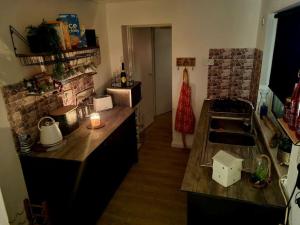 a kitchen with a sink and a counter top at The Light House in Seaham