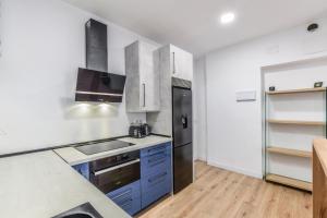 Kuchnia lub aneks kuchenny w obiekcie MyHouseSpain - Moderno apartamento ubicación inmejorable Madrid