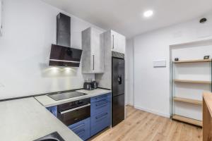 Kuchnia lub aneks kuchenny w obiekcie MyHouseSpain - Moderno apartamento ubicación inmejorable Madrid