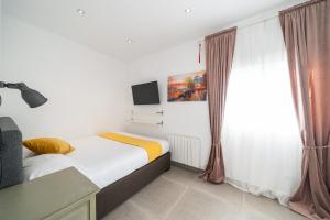 Posteľ alebo postele v izbe v ubytovaní Villa Deborah