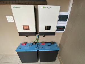 a machine with a control panel next to a wall at Oost Street in Polokwane