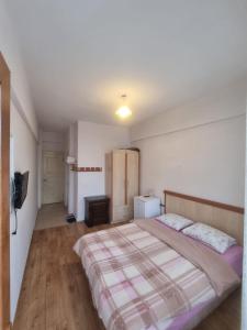 Postel nebo postele na pokoji v ubytování Thermal Orkide Pansiyon + 19 fotografií