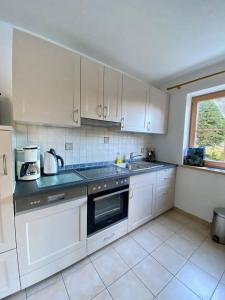 Kuchyň nebo kuchyňský kout v ubytování Apartment Krummholz