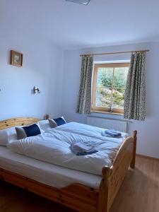 Postel nebo postele na pokoji v ubytování Apartment Krummholz