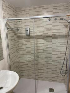 Kúpeľňa v ubytovaní HOSTAL CID