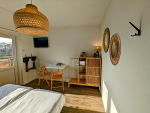 Photo de la galerie de l'établissement Budget Hotel Vrouwenpolder, à Vrouwenpolder 33 autres photos