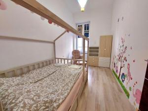 A bed or beds in a room at Vivi Residence 2