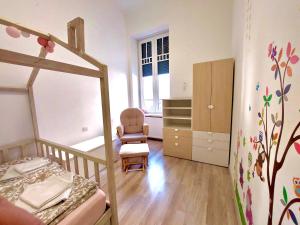 A bed or beds in a room at Vivi Residence 2