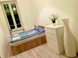 A bed or beds in a room at Vivi Residence 2
