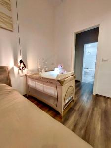A bed or beds in a room at Vivi Residence 2