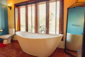 Koupelna v ubytování Nakara Villas & Glamping Udon Thani