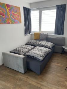 A bed or beds in a room at MK Apartment FREE Parking