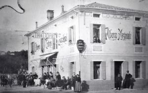 a group of people standing outside of a building at NAZIONALE Camere in Montebelluna