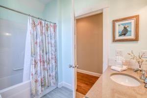 a bathroom with a sink and a shower at The Driftwood in Depoe Bay +73 photos