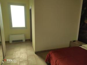 Postel nebo postele na pokoji v ubytování Villa ARA rossa
