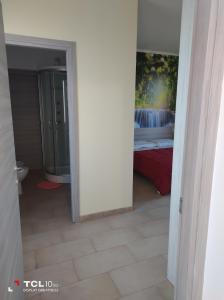 Postel nebo postele na pokoji v ubytování Villa ARA rossa