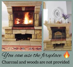 a fireplace and a picture of a fire place at Jetset Parisian Holiday Home in Cesson +60 photos