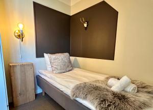 Postel nebo postele na pokoji v ubytování Kungshaga Hotell