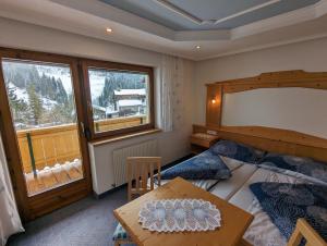 A bed or beds in a room at Apartment Fatlar