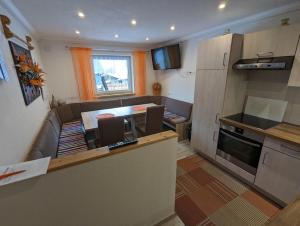 Kuchyň nebo kuchyňský kout v ubytování Apartment Fatlar