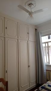 En eller flere senge i et værelse på Refúgio Aconchegante