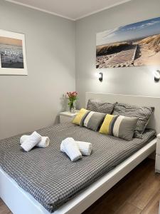 Postel nebo postele na pokoji v ubytování Apartamenty Baltic 16B/5