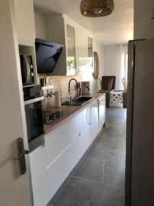 Køkken eller tekøkken på Appartement cosy à Boyardville