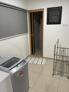Kuchyň nebo kuchyňský kout v ubytování Menara Sentral at Juru Sentral