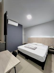 Postel nebo postele na pokoji v ubytování HOTEL NABU DEL PACIFICO