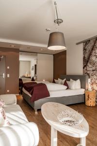 Postel nebo postele na pokoji v ubytování Hotel Villa Lago Garni