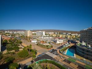an aerial view of a city with buildings and a street at Las Arenas Playa del Ingles Apartment 413 in San Bartolomé +2 photos