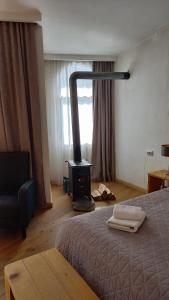Un pat sau paturi într-o cameră la Bapsha Guesthouse