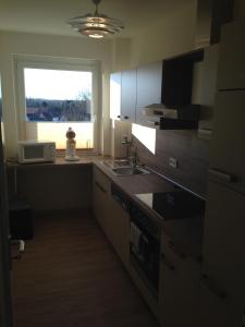 Кухня или кухненски бокс в Apartment Ginsterweg