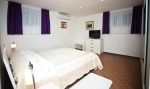 Posteľ alebo postele v izbe v ubytovaní Apartment Lina Deluxe