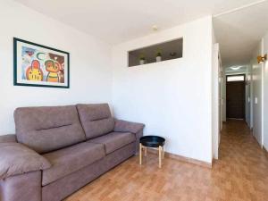 Posezení v ubytování Marlenghi Apartments 412